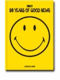 Assouline Smiley: 50 Years of Good News book - Yellow