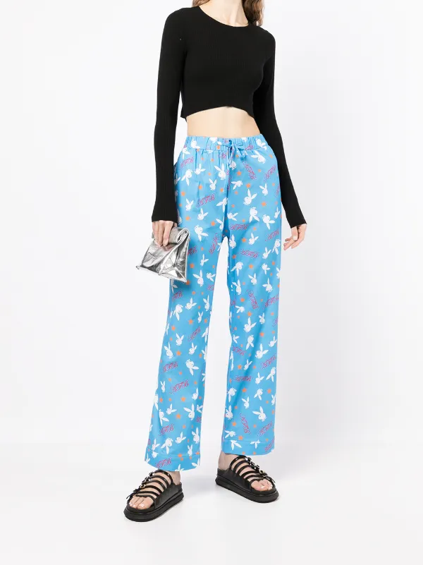 AFB Playboy motif-print Trousers - Farfetch