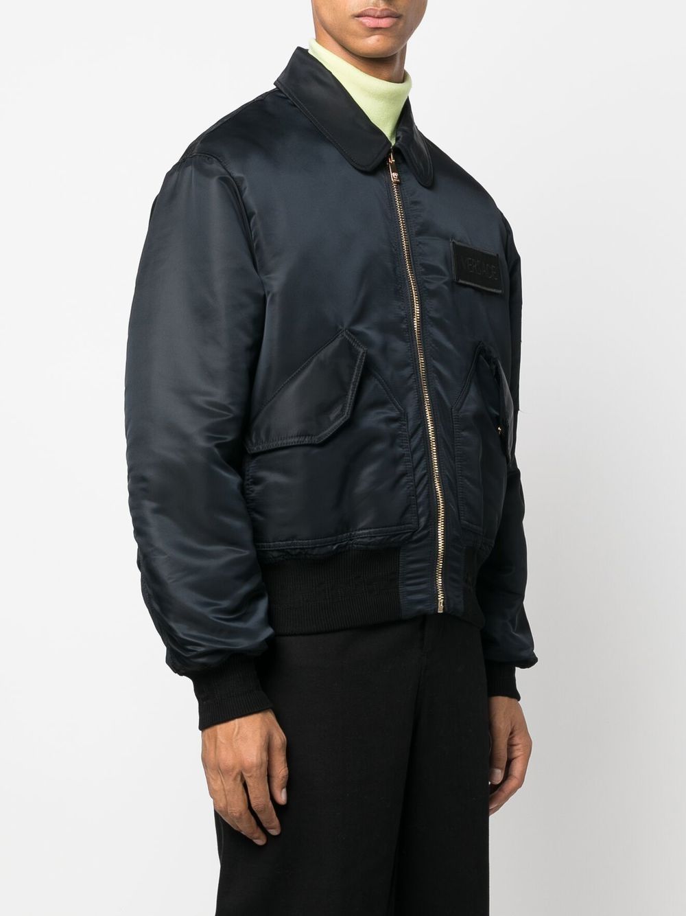 Shop Versace Logo-patch Padded Bomber Jacket In Schwarz