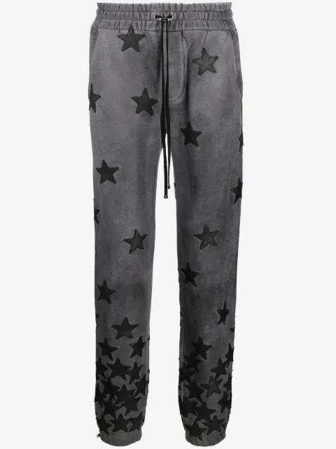 AMIRI pantalon de jogging imprimé à effet délavé