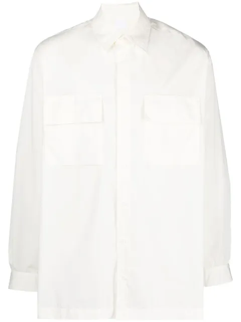 Nike camisa con botones y bolsillos de parche