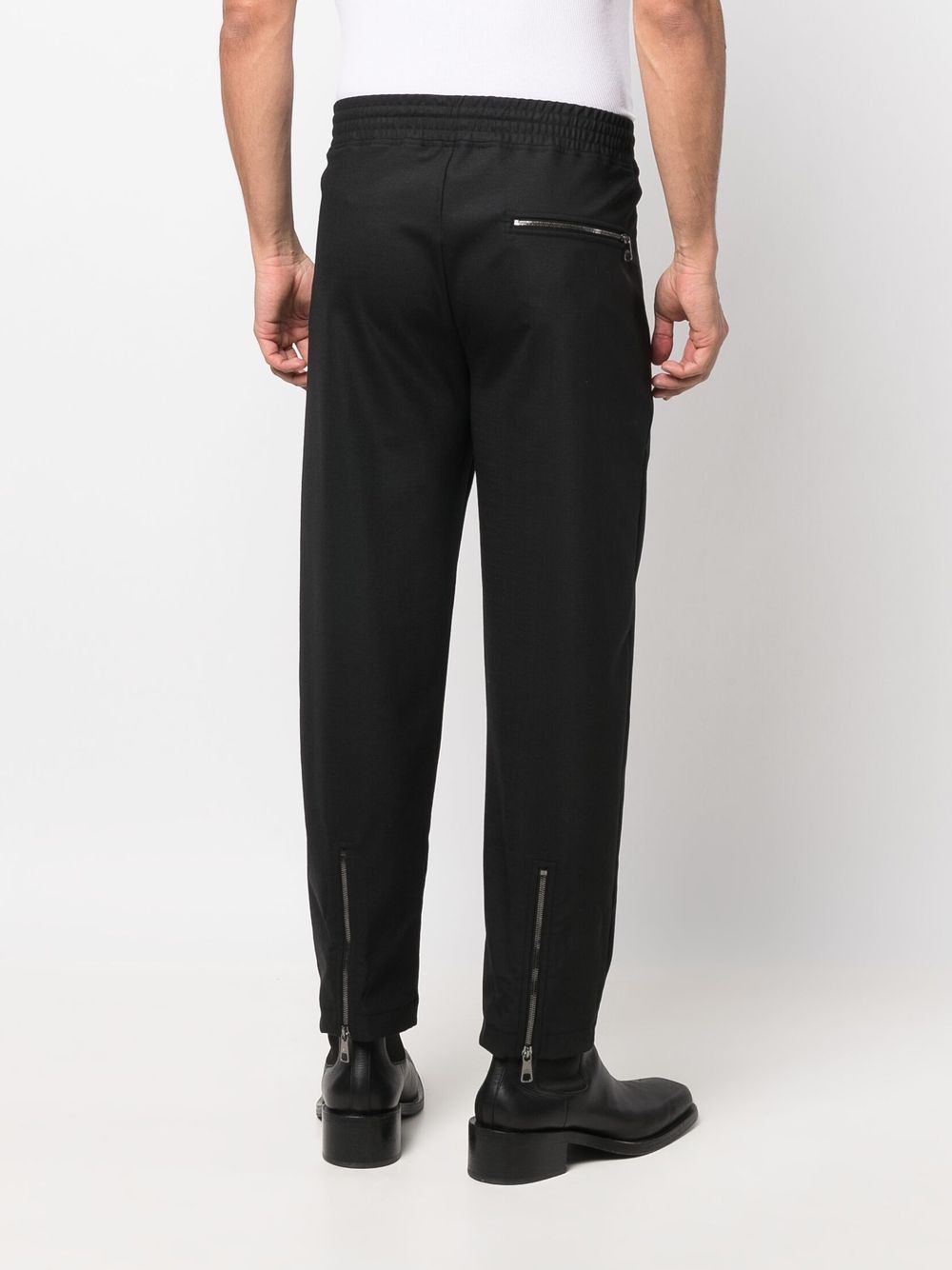 Neil Barrett Ribbed Leggings, $1,370, farfetch.com