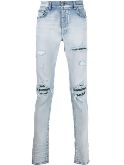 low-rise slim-fit jeans | AMIRI 