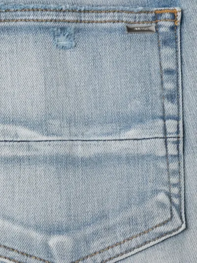 low-rise slim-fit jeans | AMIRI 