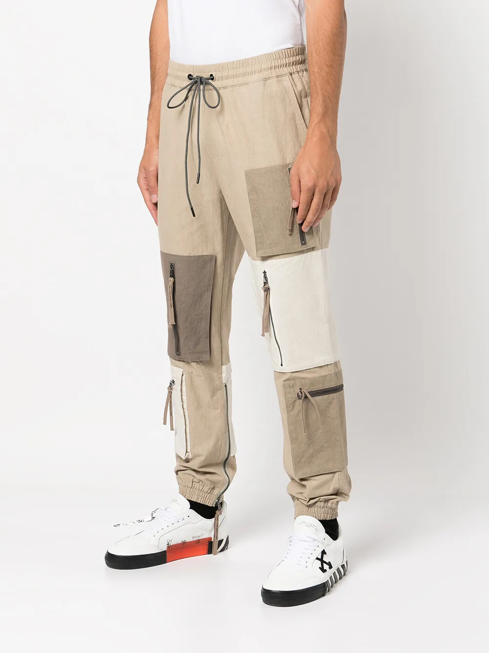 Shop Mostly Heard Rarely Seen Patchwork Zip-pocket Trousers In Brown