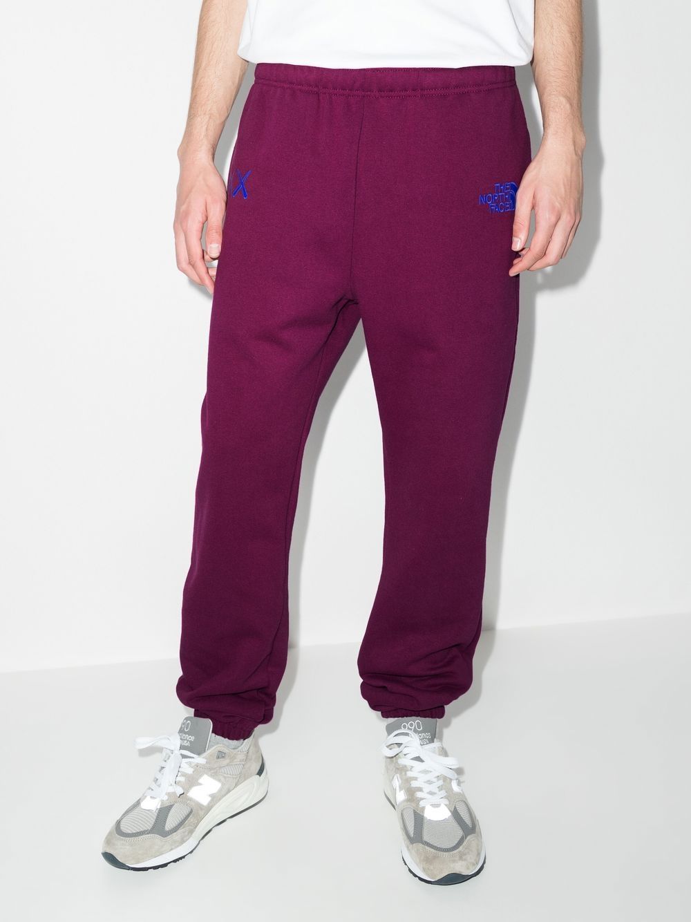 Shop The North Face X Kaws Track Pants In Purple