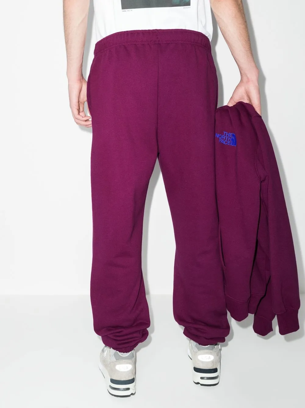 x KAWS track pants