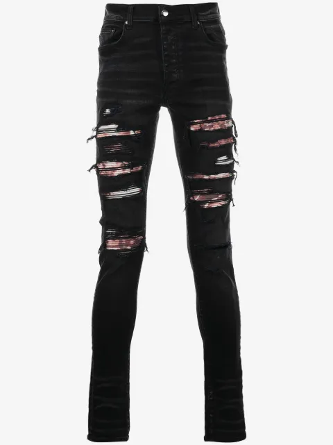 AMIRI 디스트레스드 스키니 진