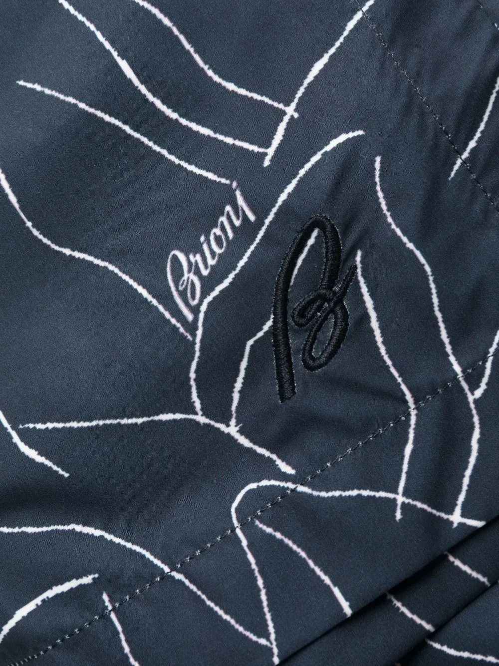 leaf-print swimming shorts