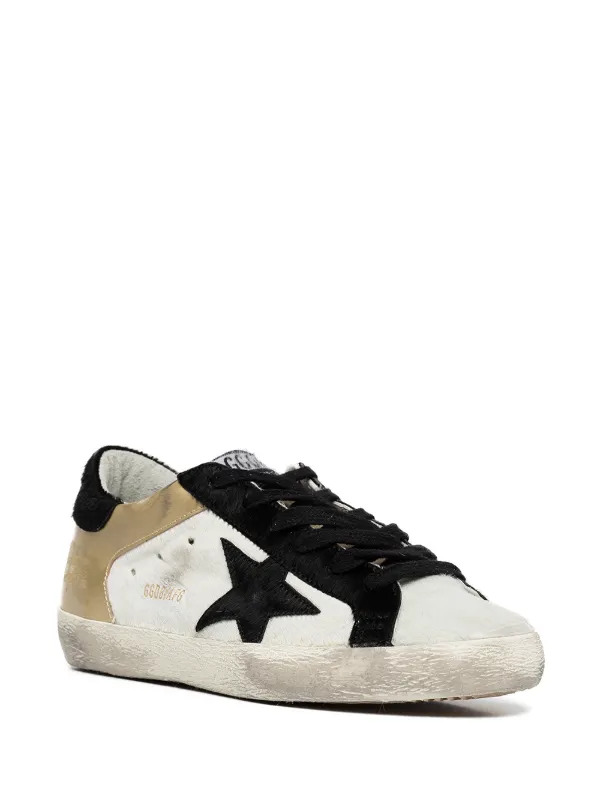 golden goose white and black superstar sneakers