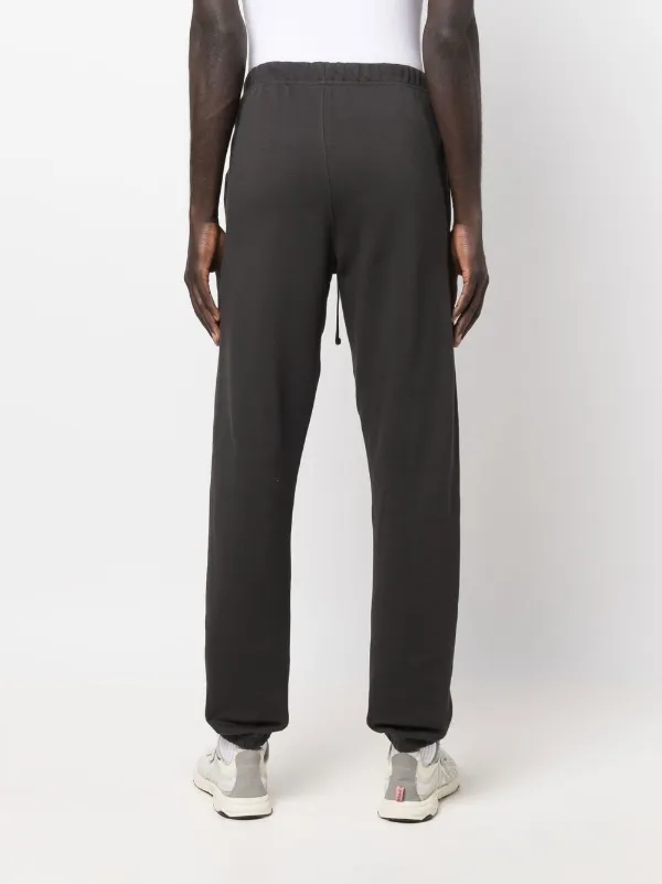 FEAR OF GOD ESSENTIALS slim-cut Track Pants | Grey | FARFETCH