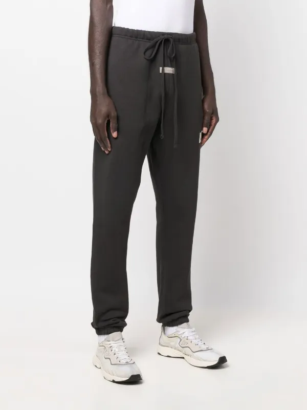 FEAR OF GOD ESSENTIALS slim-cut Track Pants | Grey | FARFETCH