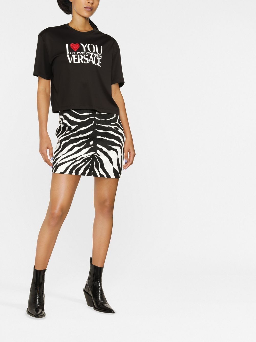 Shop Versace Slogan-print T-shirt In Schwarz