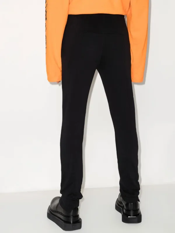 VETEMENTS トラックパンツ | ブラック | FARFETCH JP