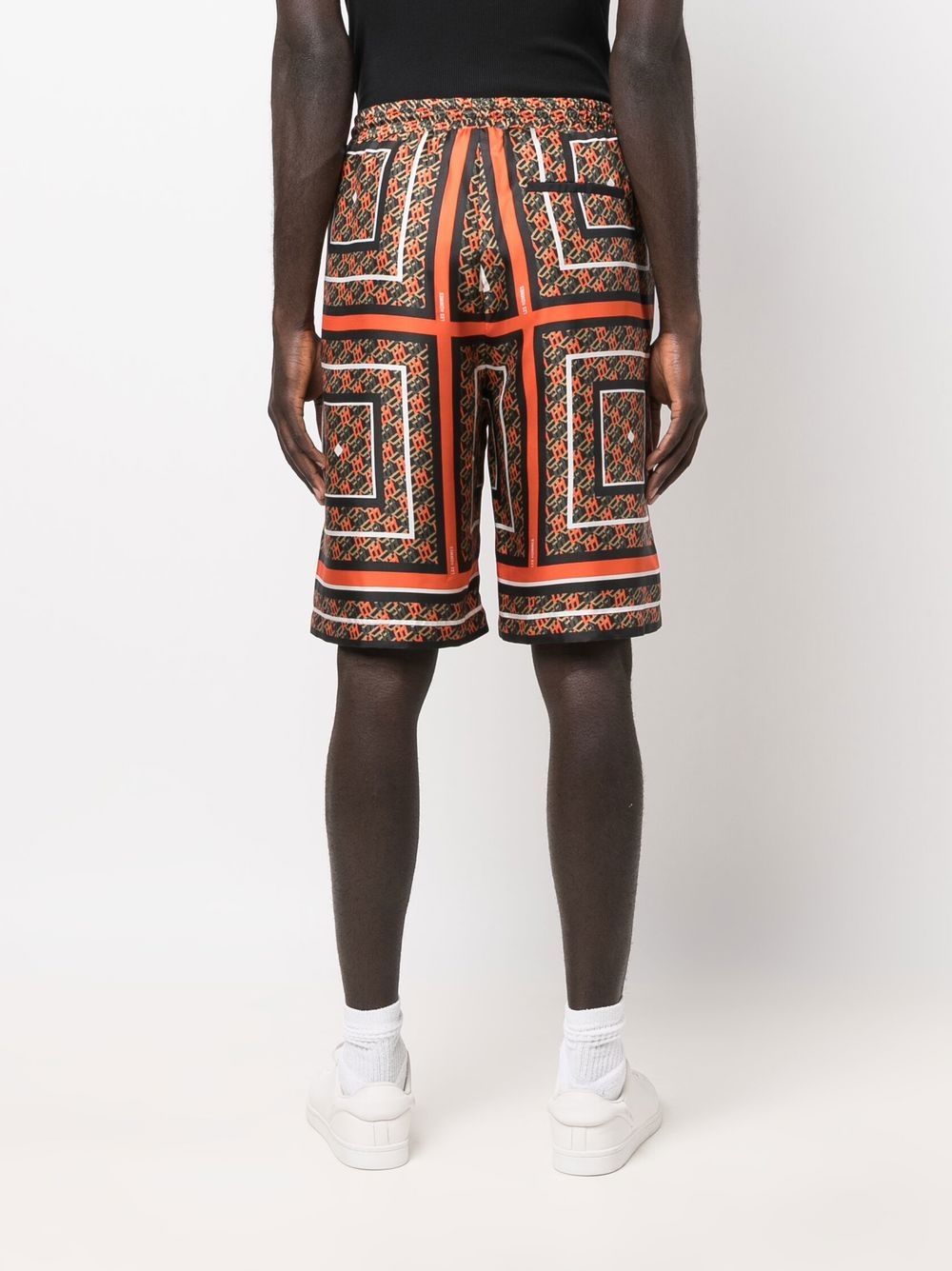 Shop Les Hommes Patterned Drawstring Silk Shorts In Orange