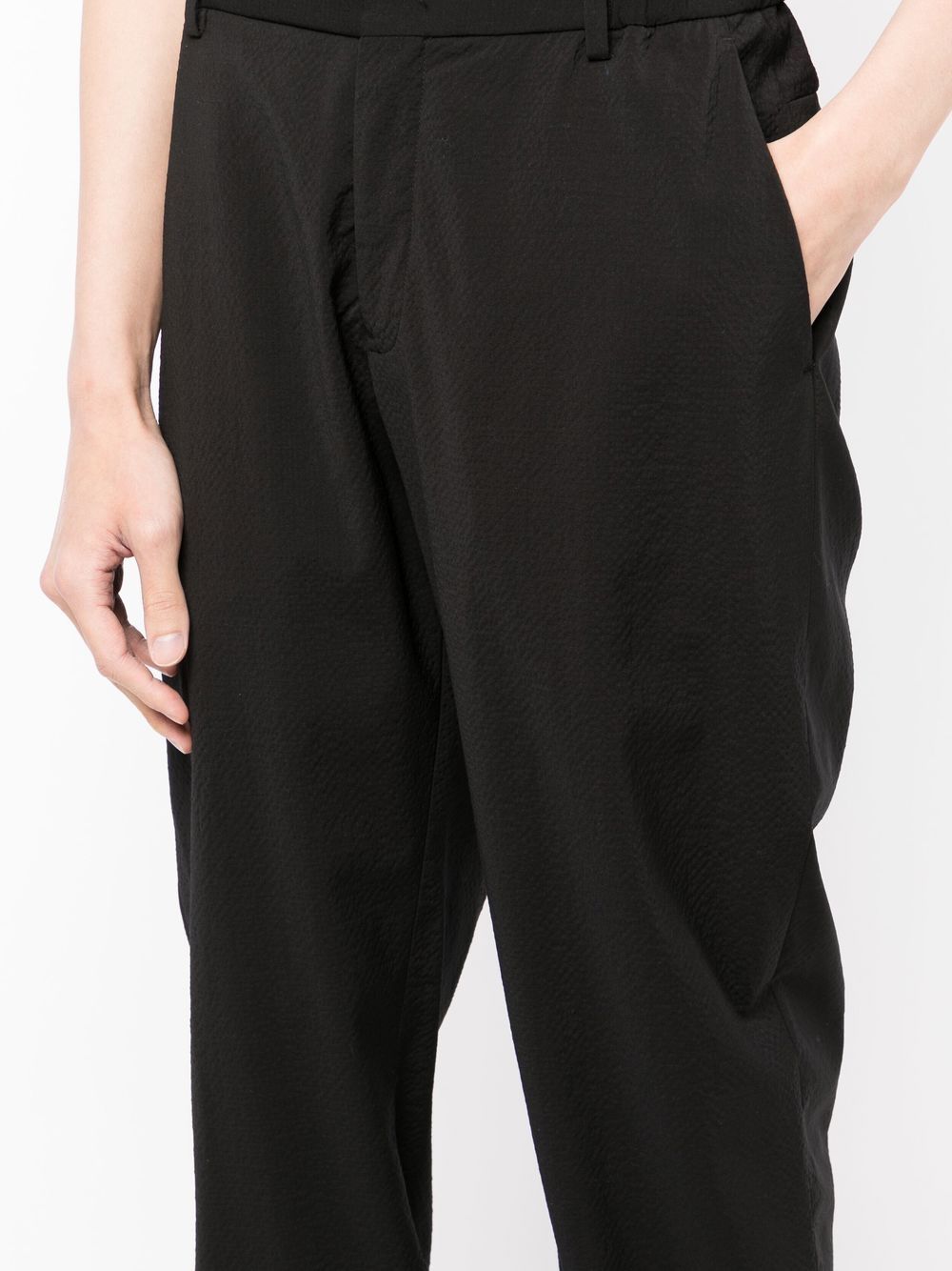 Shop Emporio Armani Cuffed Virgin Wool Trousers In Schwarz