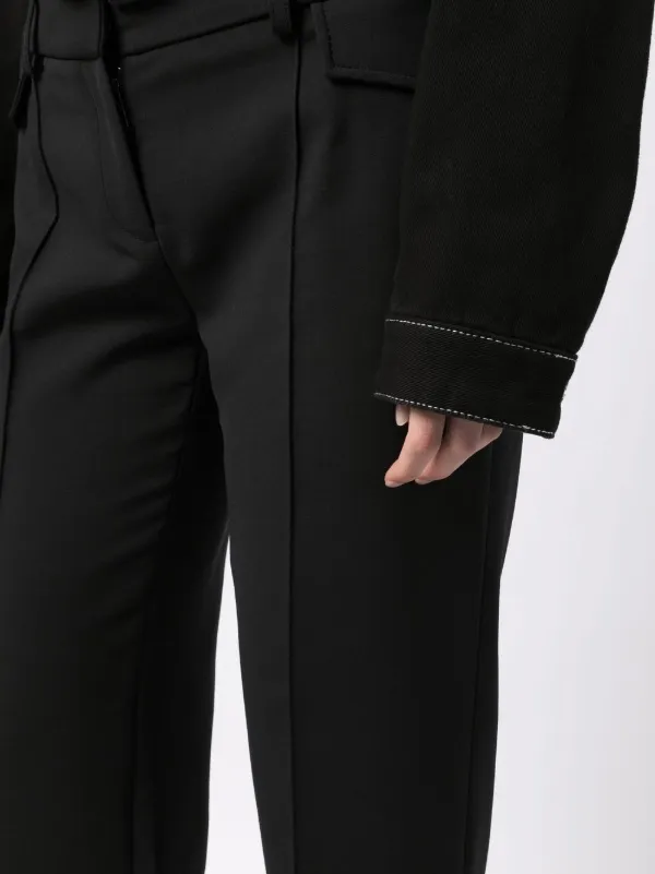 Dion Lee pocket-detail Trousers | Black | FARFETCH GE