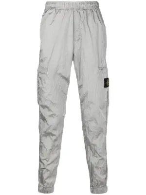 Nuova collezione di pantaloni da uomo di Stone Island su FARFETCH