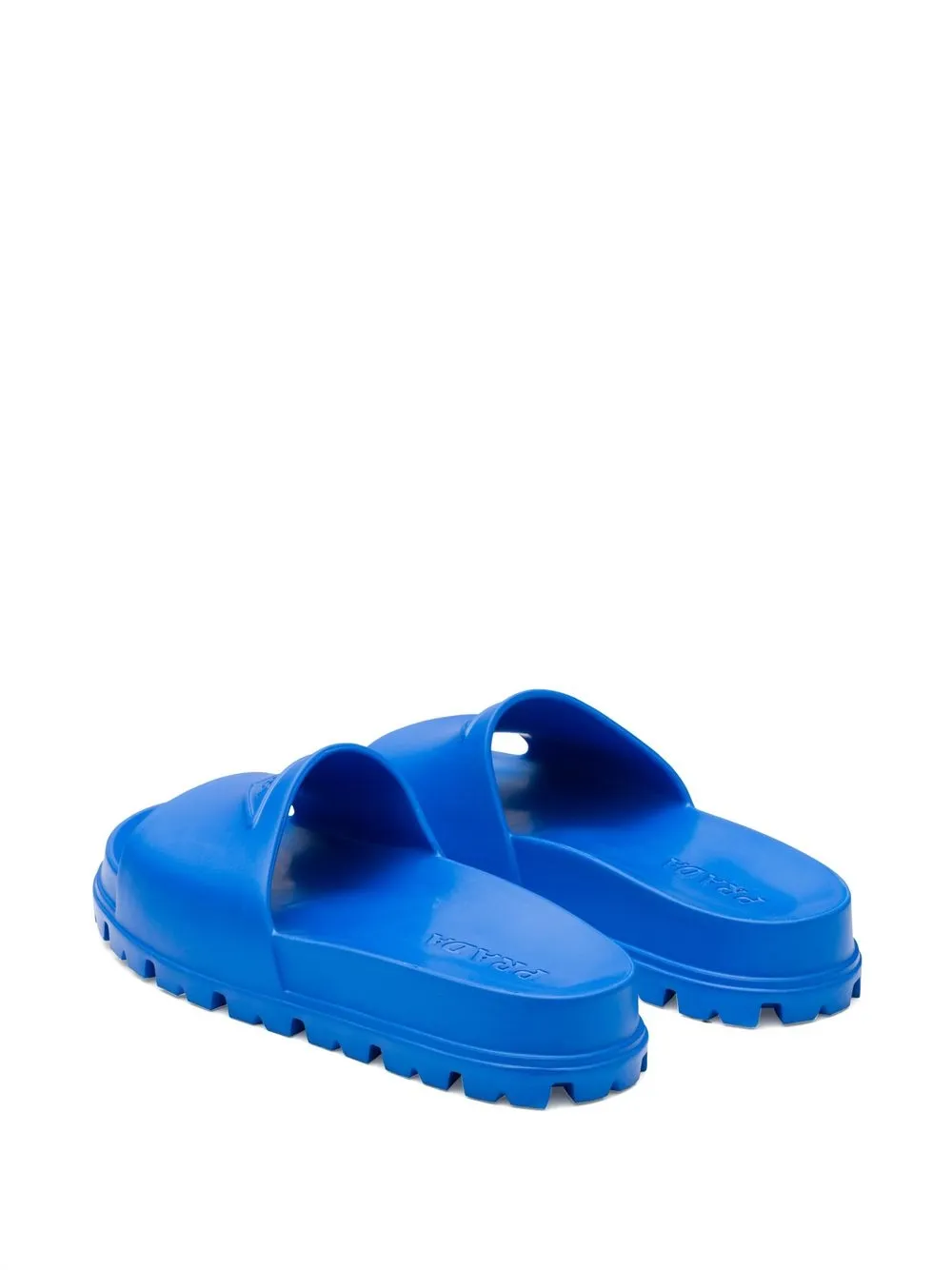 Shop Prada Embossed-logo Open-toe Slides In Blue