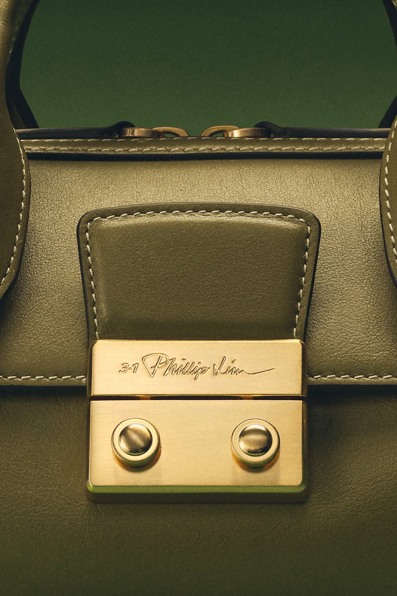 Pashli Duffle-neutrals #1 Pashli Duffle, toffee calf leather gold-tone logo plaque two top handles adjustable detachable shoulder strap front flap pocket top zip fastening main compartment- 1