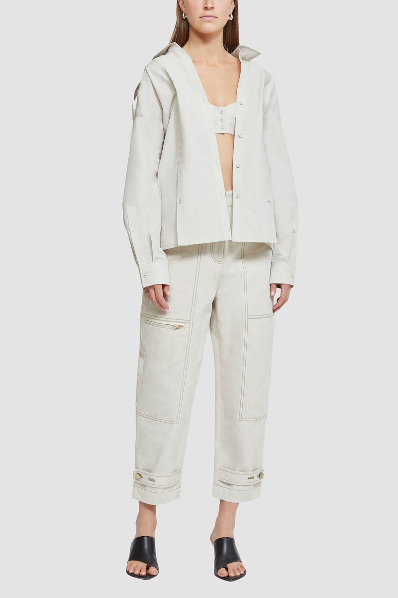 Long Sleeve Cotton Poplin Shirt -white #0 Long Sleeve Cotton Poplin Shirt , flat-collar long-sleeved shirt from 3.1 PHILLIP LIM featuring light beige, cotton blend, oversized pointed collar, front button fastening, long sleeves, buttoned cuffs and straight hem.- 0