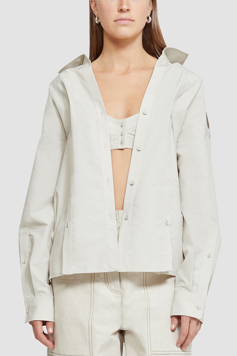 Long Sleeve Cotton Poplin Shirt -white #1 Long Sleeve Cotton Poplin Shirt , flat-collar long-sleeved shirt from 3.1 PHILLIP LIM featuring light beige, cotton blend, oversized pointed collar, front button fastening, long sleeves, buttoned cuffs and straight hem.- 1