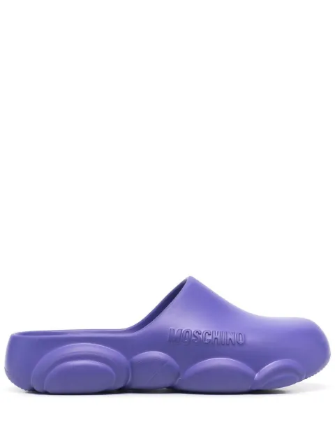 Moschino mules con logo en relieve