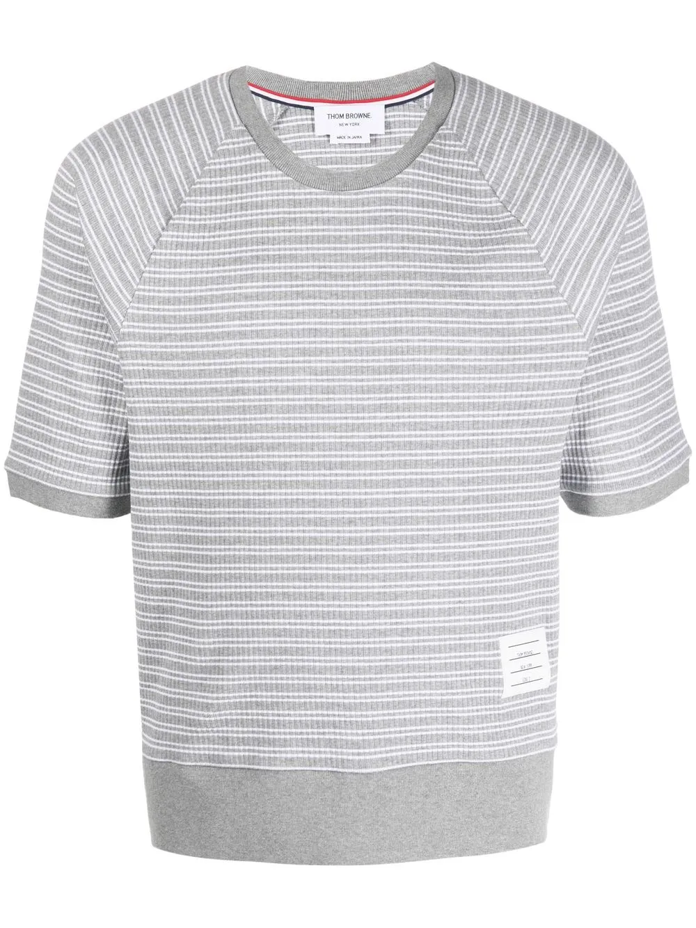 

Thom Browne playera a rayas con manga raglán - Gris