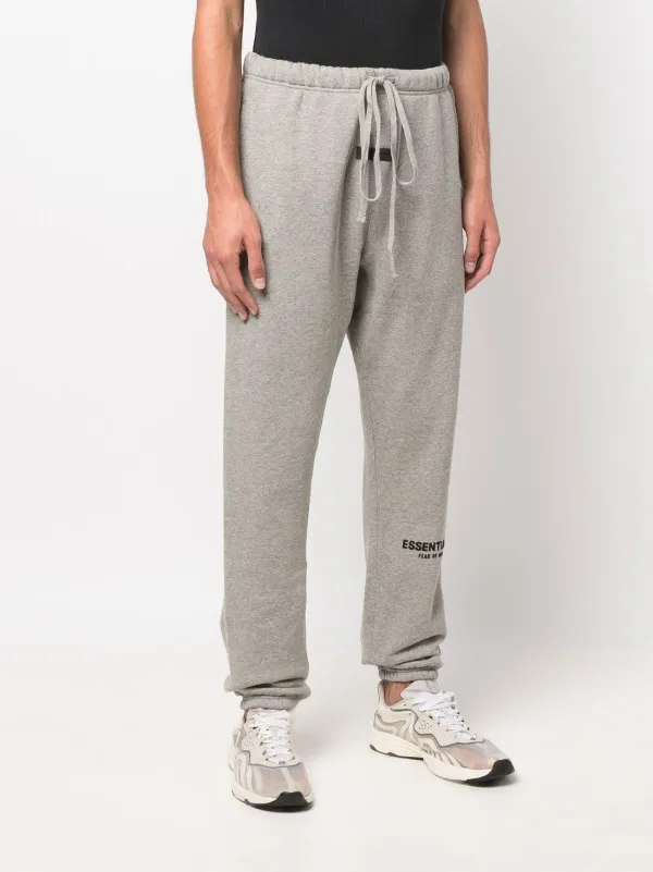 FEAR OF GOD ESSENTIALS logo-print Track Pants | Grey | FARFETCH