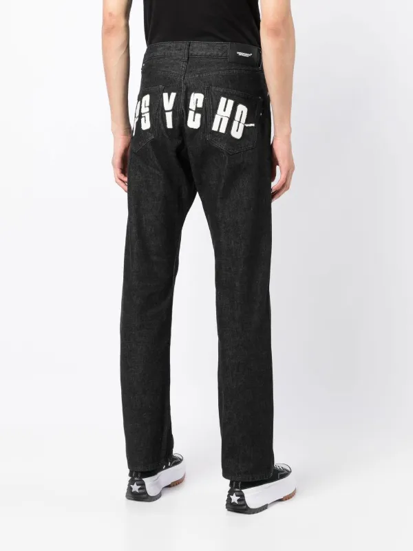 Undercover x Psycho logo-appliqué Jeans - Farfetch