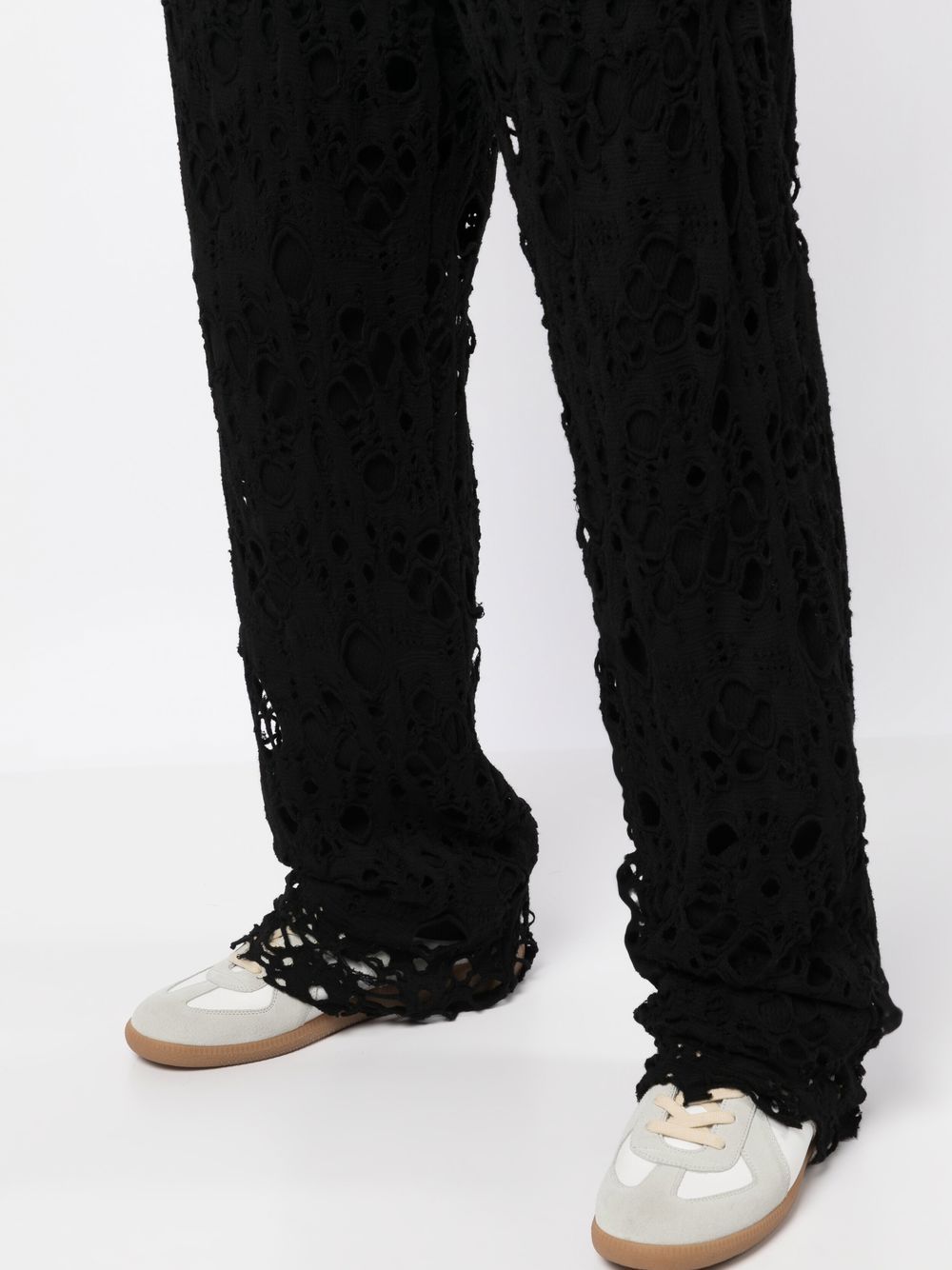 Shop Children Of The Discordance Crochet-knit Trousers In Black