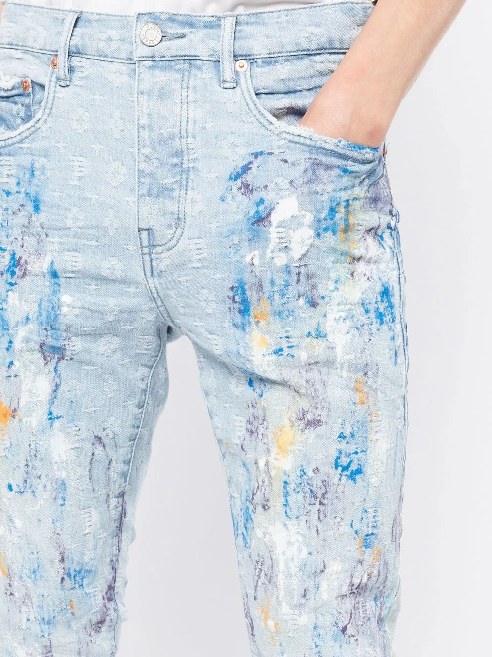 paint-splattered slim jeans