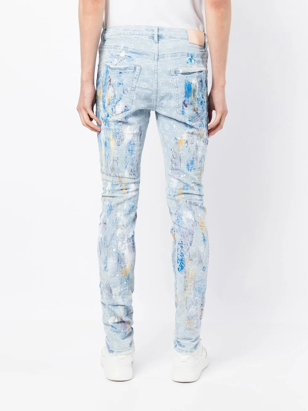 paint-splattered slim jeans
