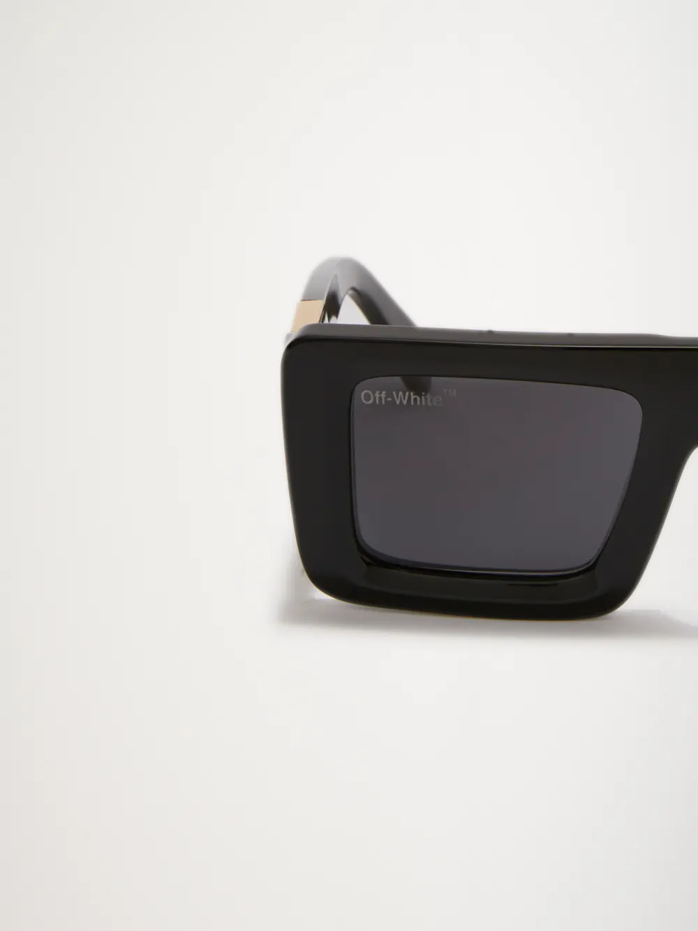 Arrows-motif tinted sunglasses