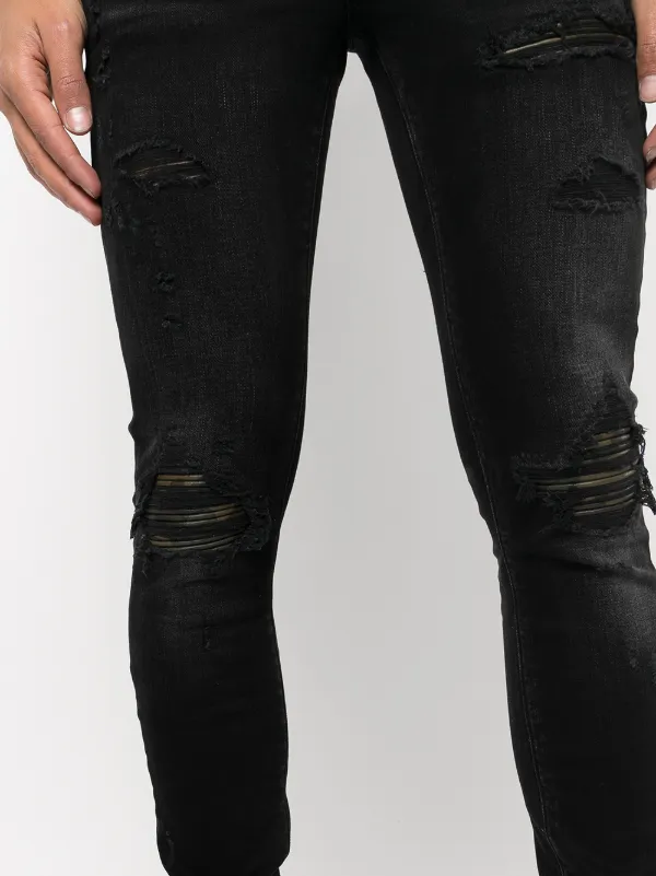 AMIRI Distressed Skinny Jeans | Black | FARFETCH
