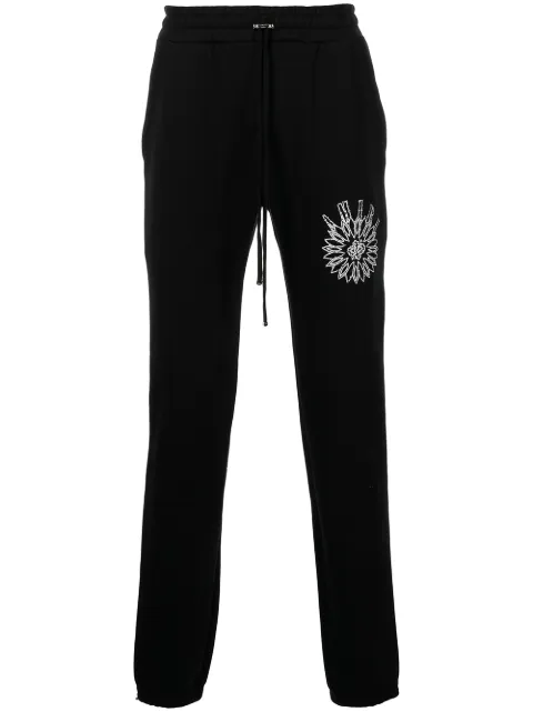 AMIRI slim-cut logo-print track pants