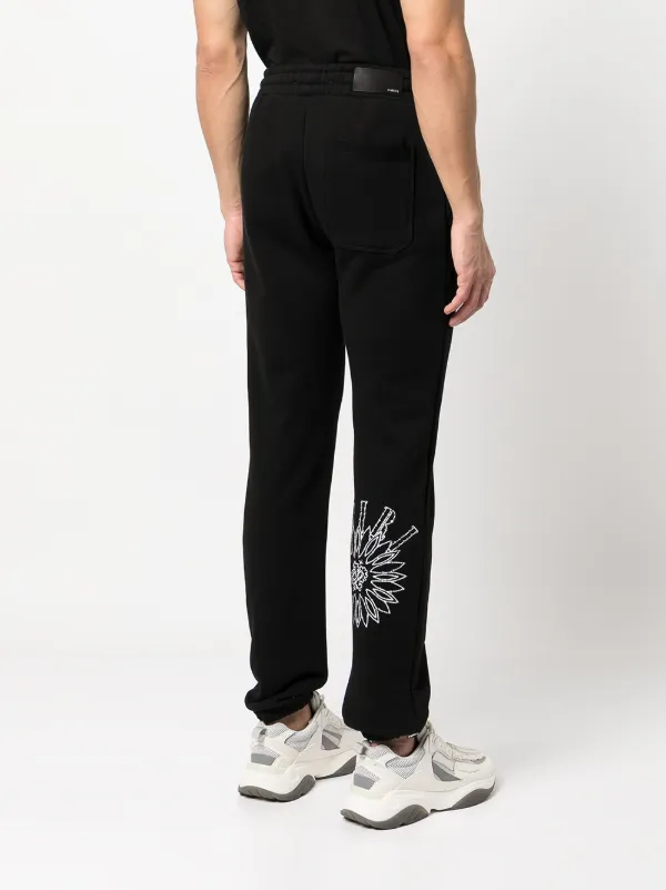 AMIRI ロゴ スリムトラックパンツ | ブラック | FARFETCH JP
