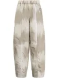 GANNI curved shell trousers - Neutrals