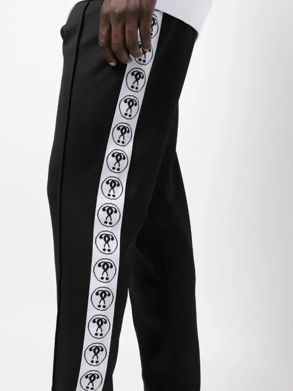 Moschino logo-print Track Pants | Black | FARFETCH GE