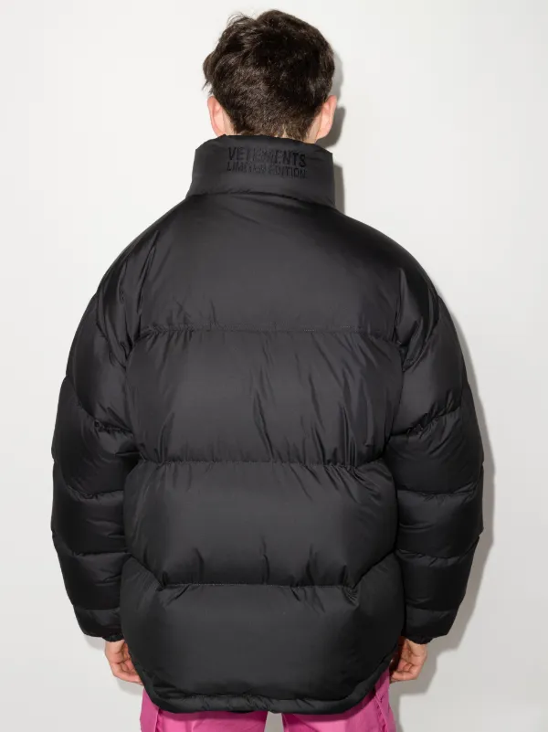 VETEMENTS logo patch Padded Coat Farfetch