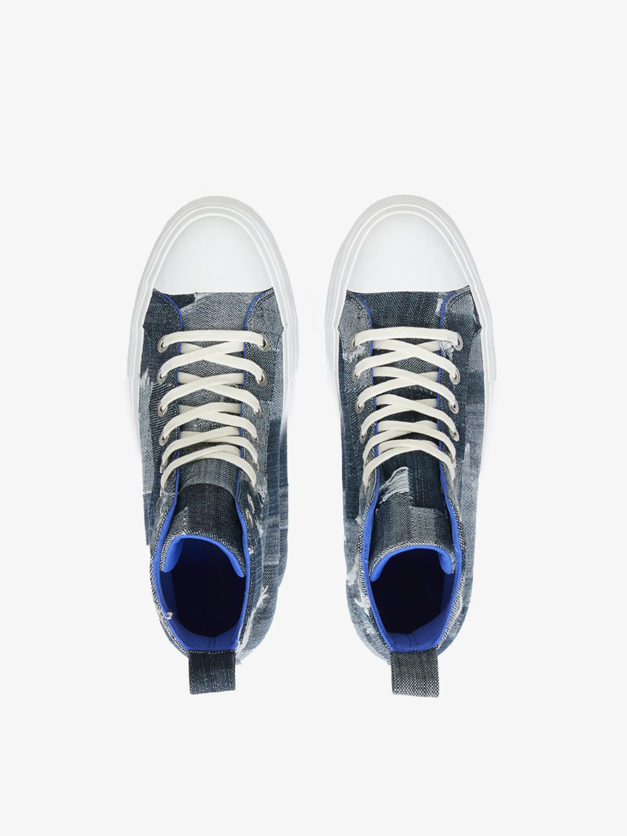 patchwork denim high-top sneakers from Marcelo Burlon County of Milan featuring blue, indigo blue, chalk white, cotton, patchwork design, round toe, contrasting toecap, front lace-up fastening, pull-tab at the heel and flat rubber sole.