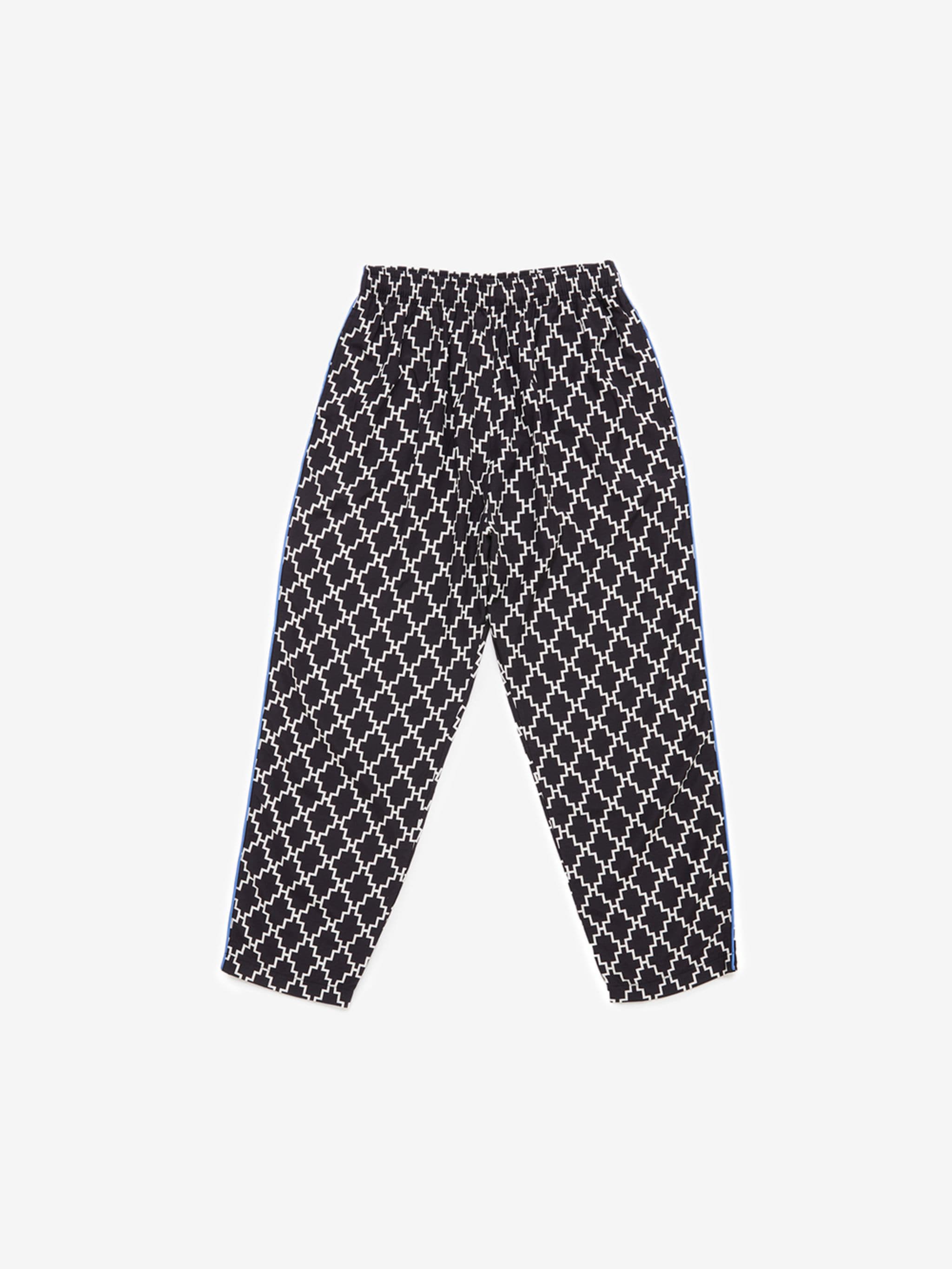 logo-print track pants from Marcelo Burlon County of Milan featuring black/white, all-over logo print, seam detailing, elasticated waistband, two diagonal pockets to the sides and straight leg.