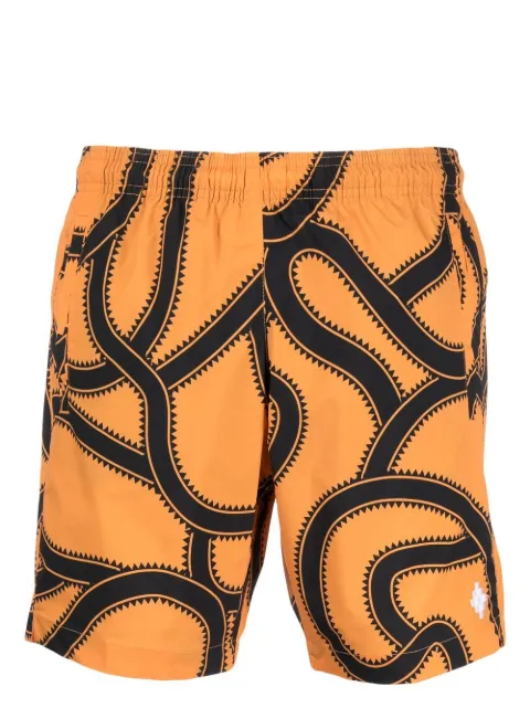 COUNTY OF MILAN shorts de playa con serpientes estampadas y cruz bordada