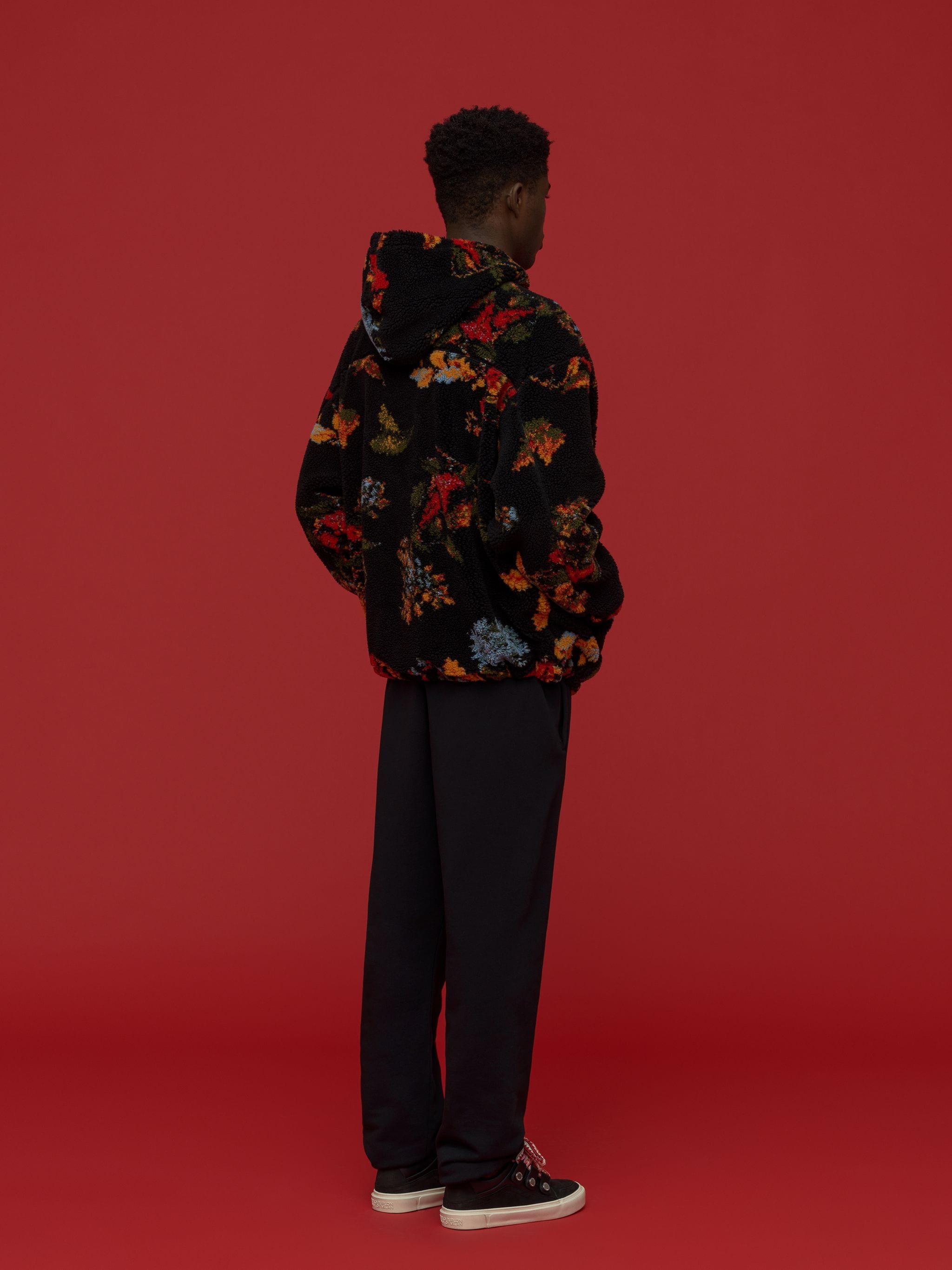 floral-print hooded fleece jacket from Marcelo Burlon County of Milan featuring black/multicolour, logo patch at the chest, fleece texture, floral print, classic hood, long sleeves, drawstring hem, two side patch pockets and front zip fastening.