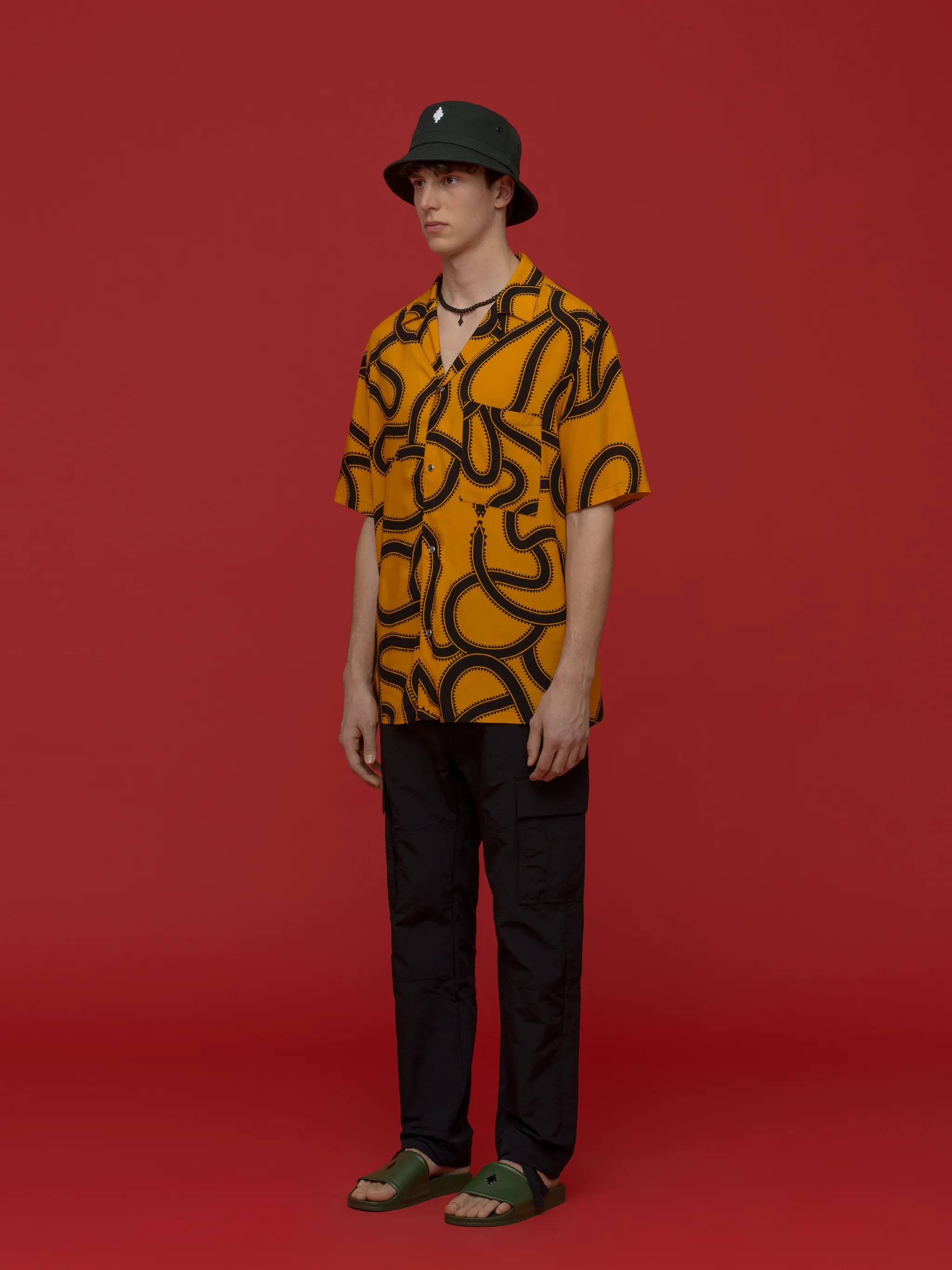 snake print short-sleeve shirt from Marcelo Burlon County of Milan featuring dark yellow, snake print, classic collar, front button fastening, chest patch pocket, short sleeves and straight hem.