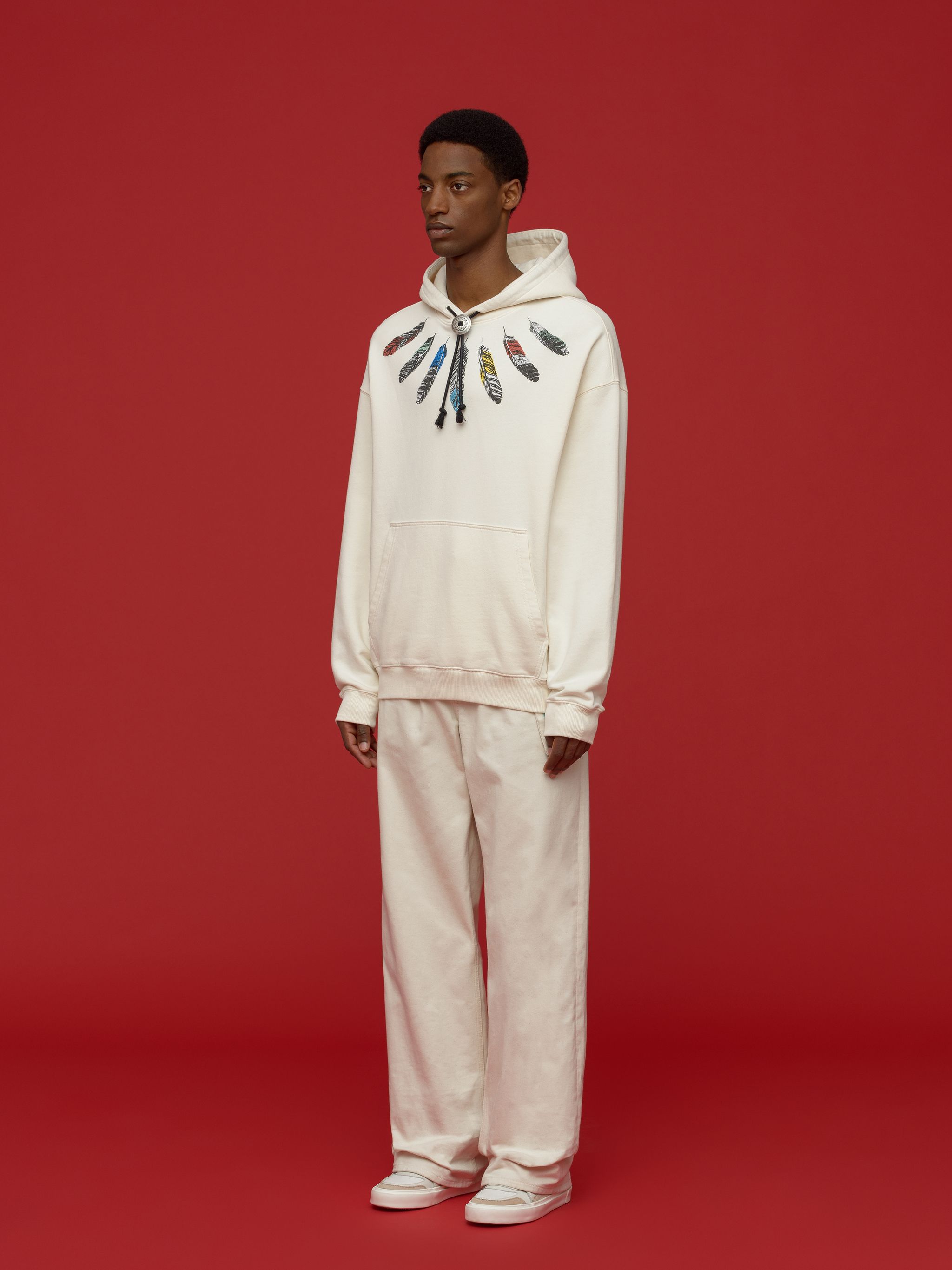 feather-print pullover hoodie from Marcelo Burlon County of Milan featuring white/multicolour, cotton, feather print, drawstring hood, long sleeves, front pouch pocket and straight hem.