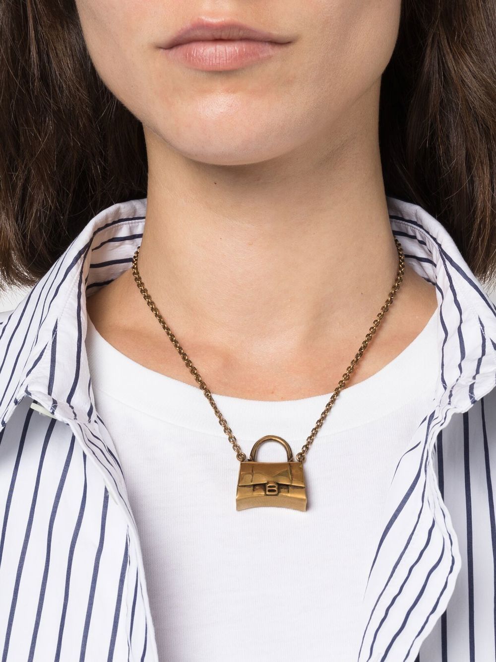 Shop Balenciaga Hourglass Pendant Necklace In Gold