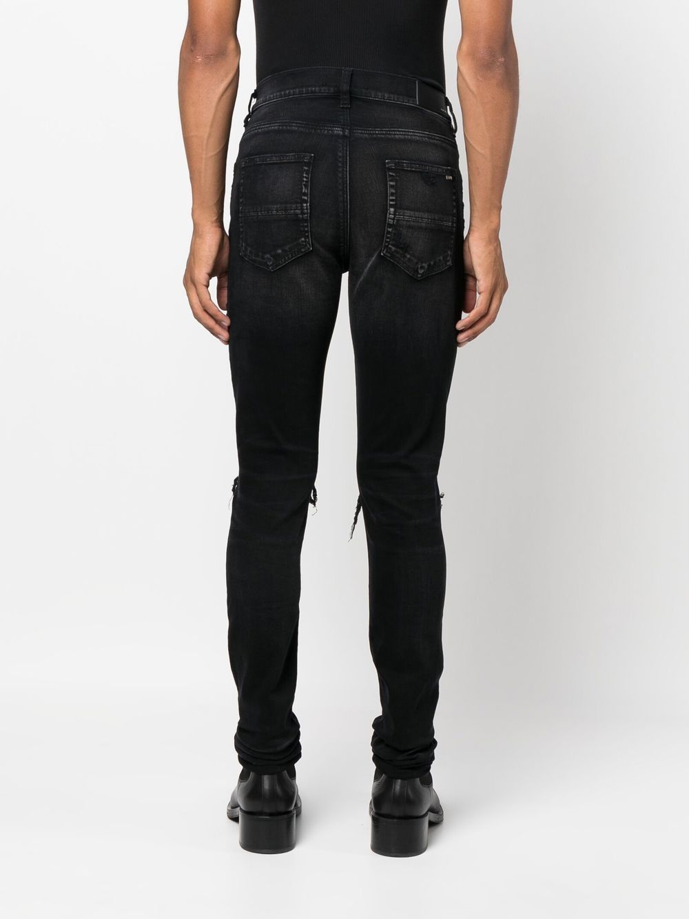 Amiri Ripped Skinny Cut Jeans Farfetch