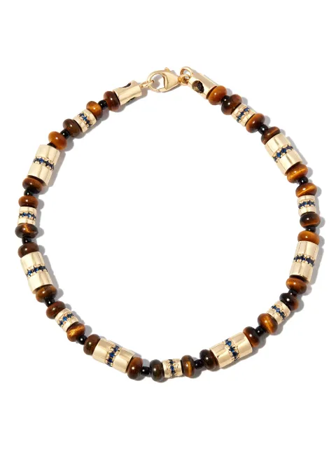 LUIS MORAIS pulsera en oro amarillo de 14kt con zafiro y ojo de tigre