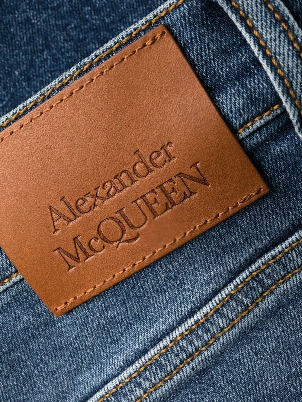 Alexander McQueen logo-patch denim jeans Women